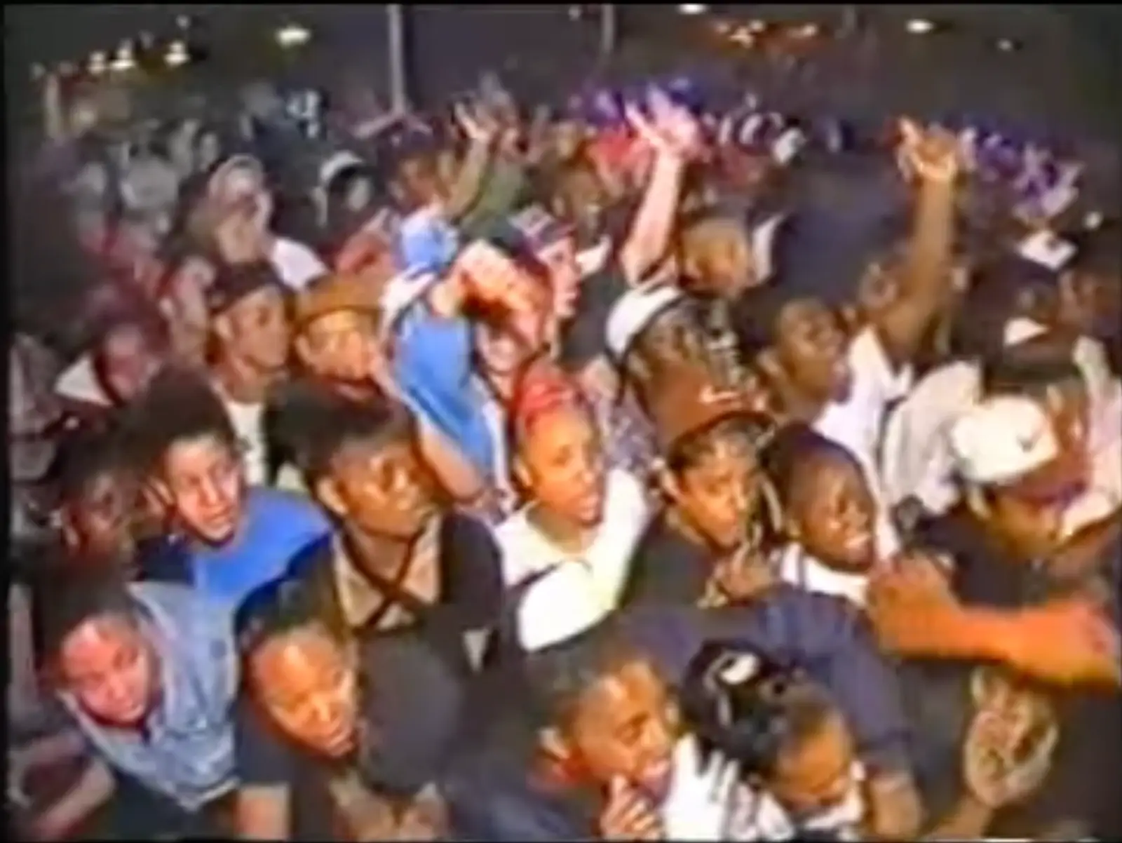 Young bubbling crowd dancing in the nineties