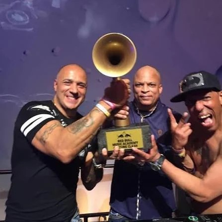 DJ Moortje, Paul Elstak and The Darkraver with the Red Bull Culture Clash trophy, 2017