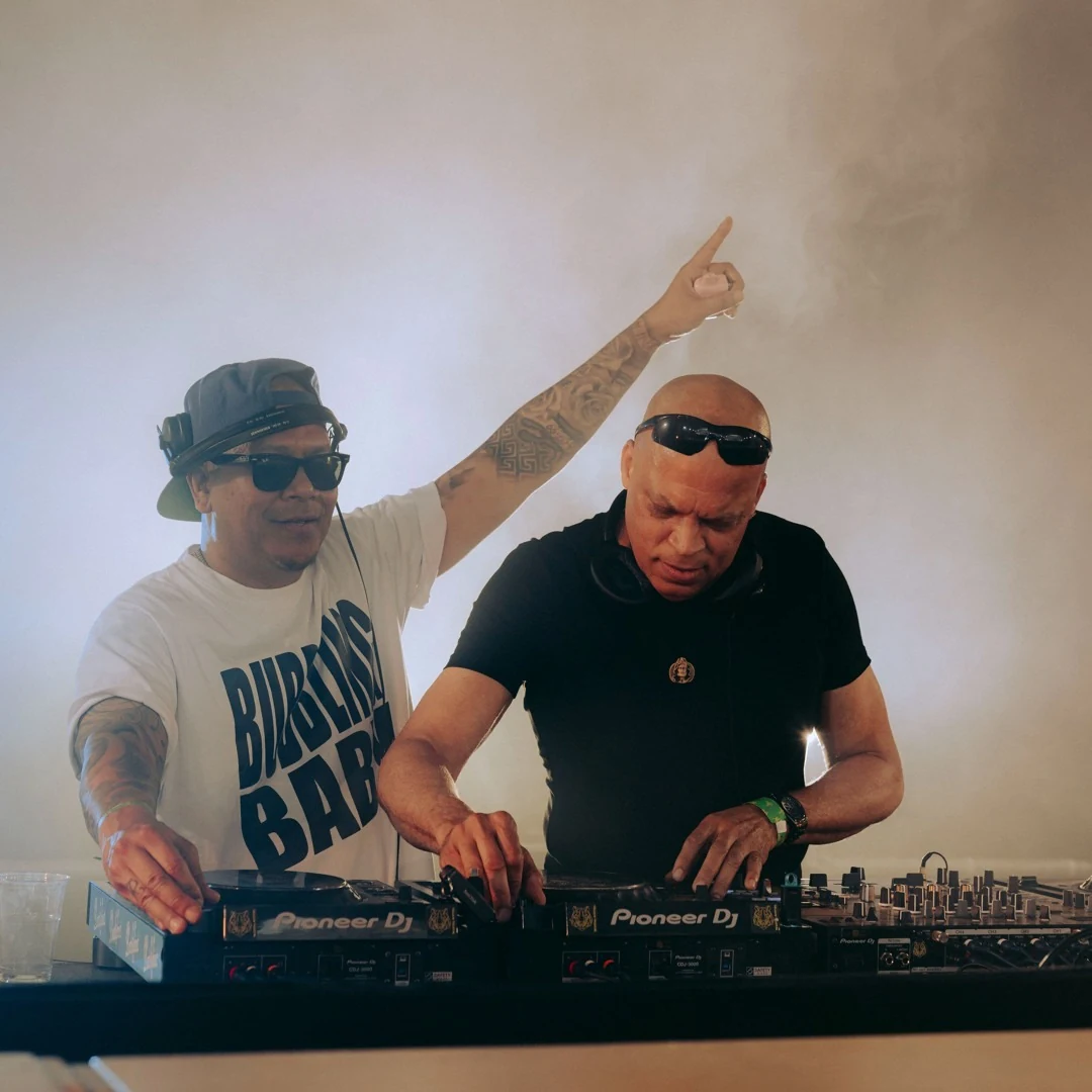 DJ Moortje and DJ Chuckie playing together behind the decks at Lente Kabinet