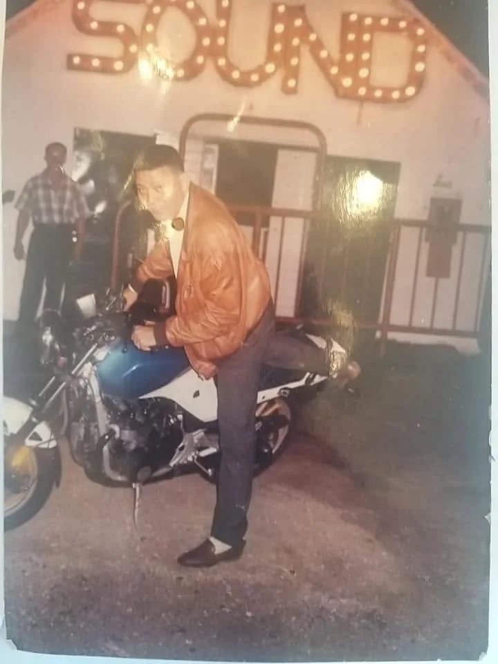 DJ Moortje on his motorbike in front of Discotheek The Sound
